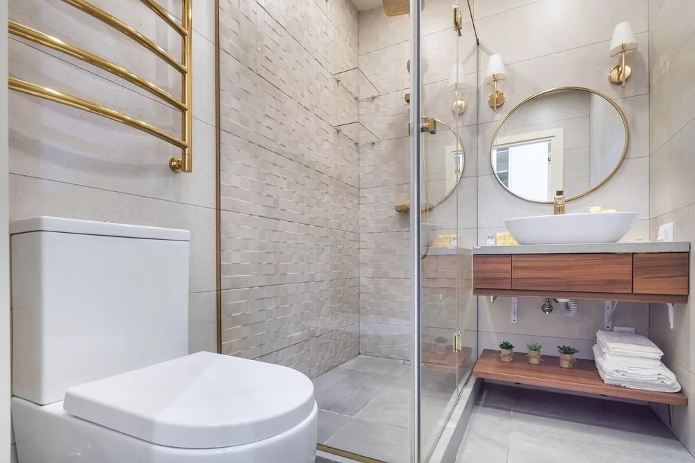 A small bathroom with a walk-in shower.
