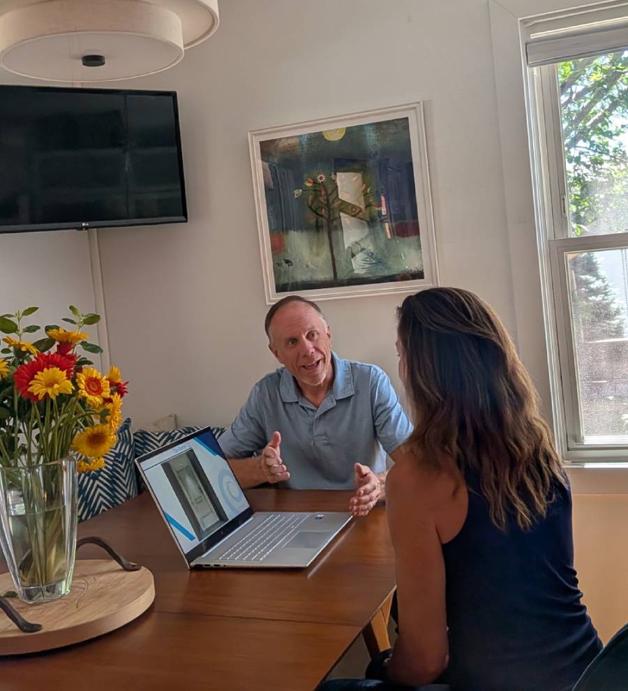 Owner of Colorado Walk in Bath and Shower Neil Cestra speaking with Customer about Bathroom Remodels